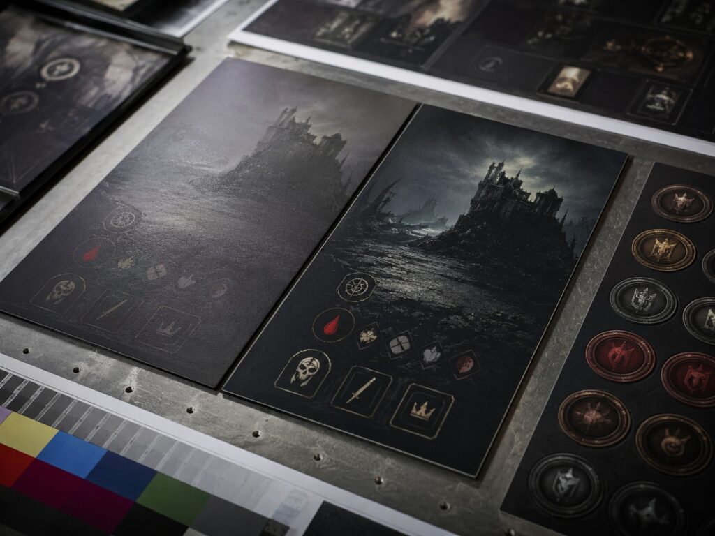 Dark board game print samples showing muddy shadow areas, clearer shadow separation, small icons, token panels, and CMYK proof control strip